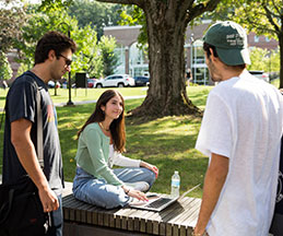 Photo of students socializing on campus. Link to Gifts of Appreciated Securities.