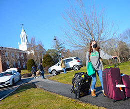 Photo of a masked student with luggage. Link to Tangible Personal Property. Photo of a masked student with luggage. Link to Tangible Personal Property.