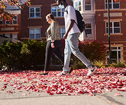 Photo of students walking on campus. Link to Gifts by Estate Note.