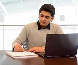 Photo of a student studying. Link to Gifts from Retirement Plans.